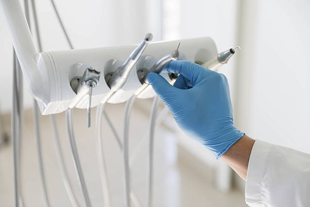 Professional Root Canal Treatment technician working in Del City, OK